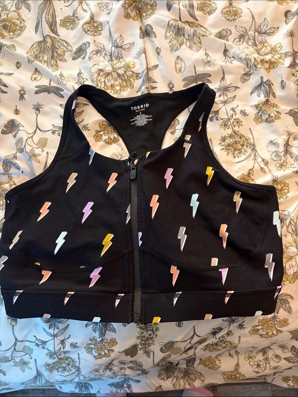 torrid Black Zip-Front Crop Sports Bra with Pastel Lightning Bolts